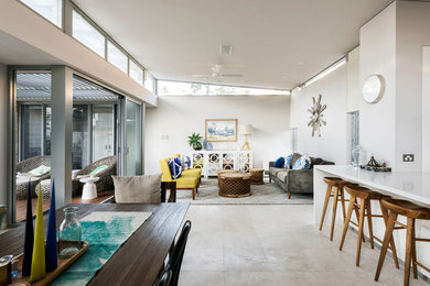Contemporary family room in Perth with white walls.