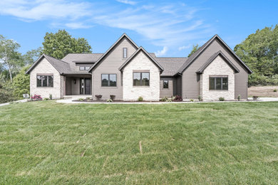 Inspiration for a transitional exterior home remodel in Grand Rapids