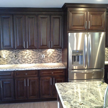 Alaskan White Granite paired with Mocha Cabinetry