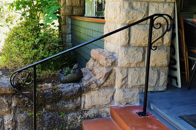 Inspiration for a medium sized modern front metal railing veranda in Other.