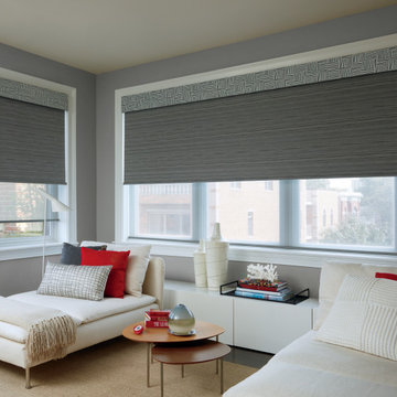 Patterned dual Roller Shades with custom cornice.
