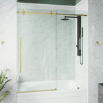 VIGO - VIGO Elan E-class 60"x66" Frameless Sliding Shower Door, Matte Gold - The VIGO Elan E-class Frameless Sliding Bathtub Door. Introduce a modern aesthetic to your bathroom with premium stainless-steel construction and eye-catching roller disks. Crafted with high-quality tempered glass and stainless steel hardware in matte brushed gold finish, Elan E-class will be a long-lasting component of your home. The glass door supports either a left-side or right-side opening installation. The single water deflector redirects water toward the inside of the tub, and the full-length seal strips make the bathtub waterproof. Elan E-class allows 4 inches of horizontal adjustability, making this a perfect fit for any bathroom layout.