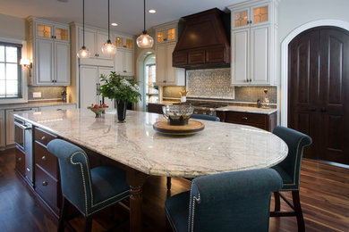 Design ideas for an expansive traditional u-shaped eat-in kitchen in Charlotte with an undermount sink, with island, raised-panel cabinets, white cabinets, granite benchtops, blue splashback, porcelain splashback, stainless steel appliances and dark hardwood floors.