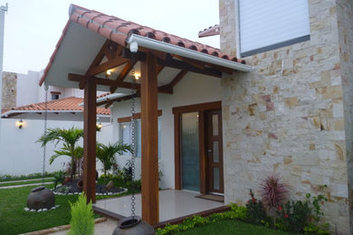Inspiration for a mediterranean entryway remodel in Other