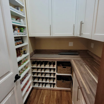 Walk in pantry with built in wine rack