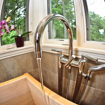 Home addition featuring master bathroom with Ofuro tub.