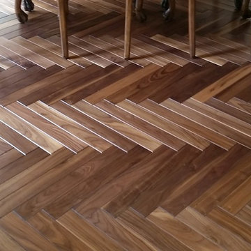 Beveled walnut solid hardwood in herringbone pattern