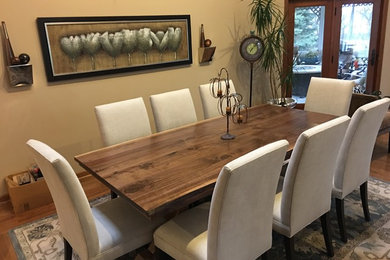 Mid-sized elegant dark wood floor enclosed dining room photo in Other with beige walls and no fireplace
