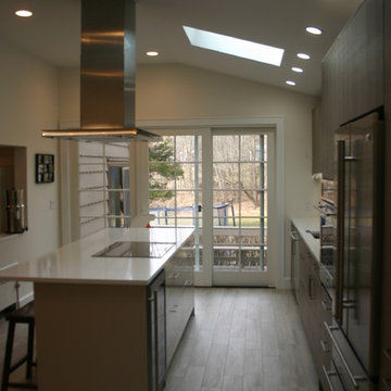 Modern kitchen in Tudor style house - view to living room
