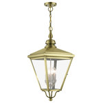 Livex Lighting Inc. - 4 Light Antique Brass Outdoor Extra Large Pendant Lantern, Brushed Nickel - The stylish antique brass finish outdoor Adams extra large pendant lantern is a great way to update your home's exterior decor. Flat metal curved arms attach to the solid brass decorative housing while clear glass shows off the brushed nickel finish cluster.