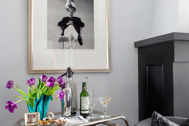 Inspiration for a small transitional enclosed living room remodel in New York with a bar