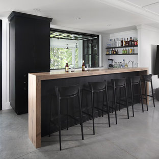 75 Beautiful Concrete Floor Home Bar With Black Cabinets