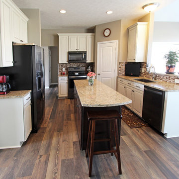 Cream Kitchen with Contrasting Dark Island with Quartz Countertop