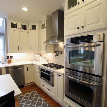 White Kitchen with Espresso Island and Eternia Caringdale Quartz Countertop