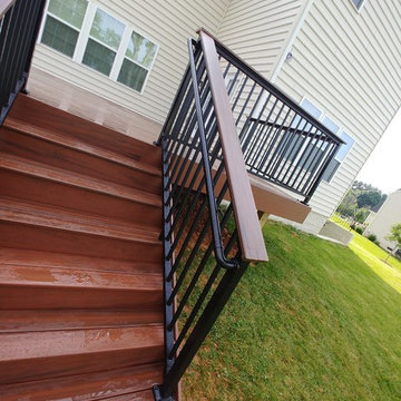 Deck building with Armadillo Decking and Black Aluminum rails