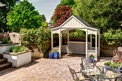 Example of a transitional exterior home design in Other