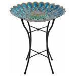 Teamson Home - Solar Bird Bath & Lights Outdoor Fusion Glass - Provide a gathering space in your backyard for your feathered friends with the Teamson Home 18" Outdoor Solar Glass Flower Mosaic Birdbath with LED Lights and Stand. This colorful glass birdbath provides a sanctuary for all types of birds while also adding a pop of color to your outdoor living space, yard, or lawn. Featuring a blue design with a flower mosaic, this stylish lawn decoration creates visual interest in your outdoor area. Fill this birdbath with water or with seed to transform it into a colorful feeder. This birdbath also includes a solar cell that charges during the day and lights up the built-in LEDs at night to illuminate your garden. Constructed from sturdy and resilient glass with an included metal stand, the bird bowl is built for years of quality outdoor use. The sturdy metal legs provide stability and prevents tipping when multiple birds gather on the bowl. For easy setup, teardown, and storage when not in use, the metal stand can fold down to a compact size. This flower birdbath is both stylish and functional, and it provides a fun addition to your courtyard, patio, or yard. This compact birdbath measures 18"L x 18"W x 21.2"H to fit almost any outdoor area and step-by-step instructions are included for easy assembly.