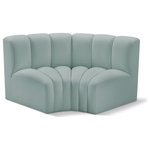 Meridian Furniture - Arc Vegan Leather Upholstered 2-Pc. Inward Curved Modular Sectional, Green - Unleash modern opulence with the Arc Vegan Leather 2pc. Sectional. Crafted for the modern connoisseur, this Sectional injects an air of refined luxury into any space. Its sleek silhouette, upholstered in supple mint green vegan leather, exudes timeless sophistication while the deep channel tufting adds textural intrigue, further elevating the chair's visual appeal. The modular design makes it a versatile chameleon, effortlessly adapting to your evolving needs and preferences. Whether you envision it gracing a chic living room corner, basking in the glow of a bedroom window, or adding a touch of drama to a home office, the Arc seamlessly complements your unique interior aesthetic.