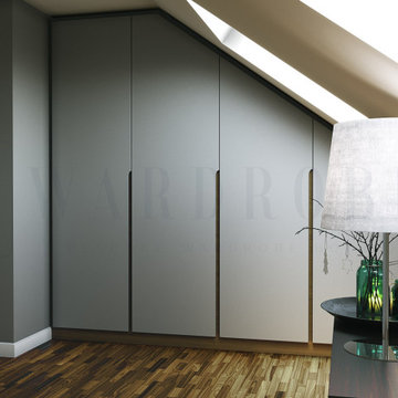 Bespoke loft wardrobe with routed handles