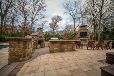 Raised Patio Outdoor Kitchen with outdoor fireplace