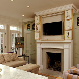 Family room - small transitional open concept medium tone wood floor family room idea in Chicago with beige walls, a standard fireplace, a wood fireplace surround and a concealed tv