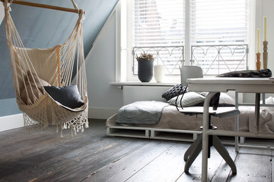 Mid-sized eclectic master bedroom in Orange County with white walls, medium hardwood floors and no fireplace.