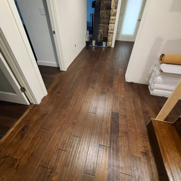 Sleek Engineered Hardwood & Modern Sliding Door by I’m The Man Services