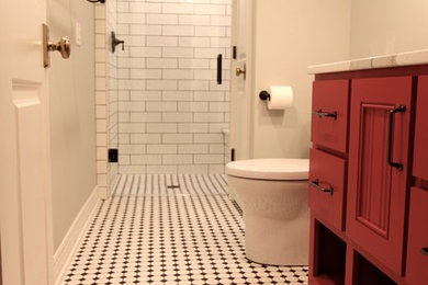 Example of a small transitional 3/4 black and white tile and subway tile ceramic tile alcove shower design in Omaha with red cabinets, gray walls, a drop-in sink and quartz countertops