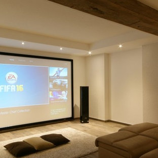 Inspiration for a contemporary home theater remodel in Frankfurt