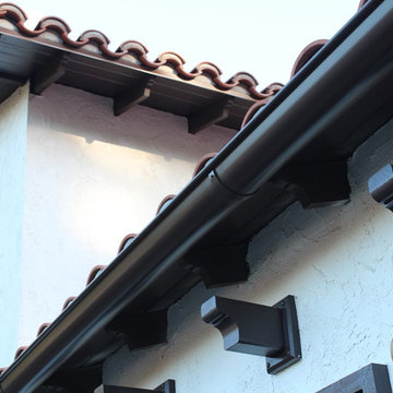 Half Round Rain Gutters with Wrap Around 10 Gauge Twisted Rafter Mount Brackets