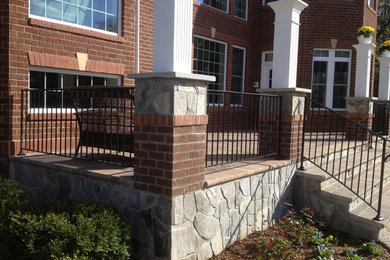 Patio - backyard concrete paver patio idea in DC Metro with a fire pit