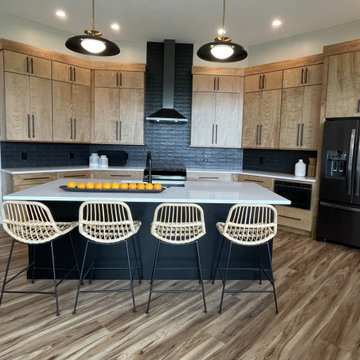Angled Kitchen Design with Slab Style Cabinets in Pecan Stain