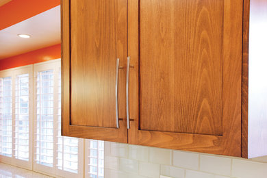 Example of a large minimalist kitchen pantry design in Los Angeles with colored appliances