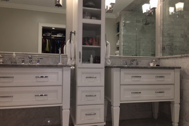 Example of a transitional master bedroom design in Jacksonville