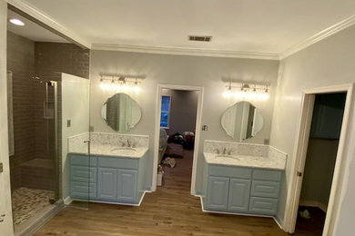 Inspiration for a farmhouse bathroom remodel in Little Rock