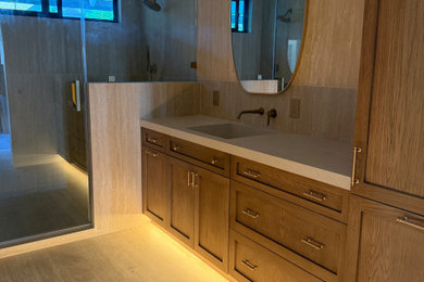 Example of a trendy bathroom design in Los Angeles with shaker cabinets