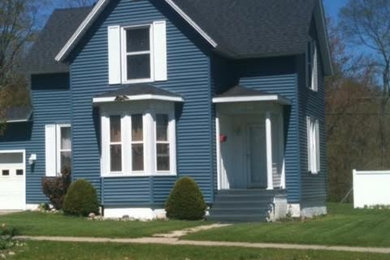 Example of a classic exterior home design in Grand Rapids