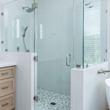 Hidden shampoo shelf inside pony wall to keep shower wall clean and clutter-free