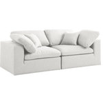 Meridian Furniture - Serene Linen Textured Fabric Deluxe Comfort 2-Piece Modular Sofa, Cream - There's lots to love about the Serene linen textured deluxe cloud-like comfort modular collection, and this piece is not an exception. The soft cream linen textured fabric is cozy and sleek to the touch while the overstuffed down/feather cushions provide gentle support so you can relax and unwind like a VIP. Customize your seating with this modular set by adding the pieces you like most. Latches under each piece make it easy to snap them into position for a look that's modern yet welcoming.