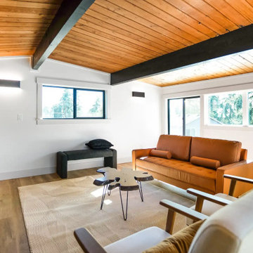 Loft Sitting Area with Wood Ceiling, Black Beam and Bar Railing – Beacon Hill