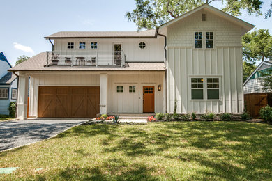 Country white two-story gable roof idea in Dallas