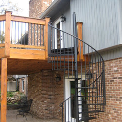 s054 Spiral Staircase with custom landing from Deck to patio in Salem, Virginia - Products