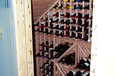 Wine cellar - traditional wine cellar idea in San Diego