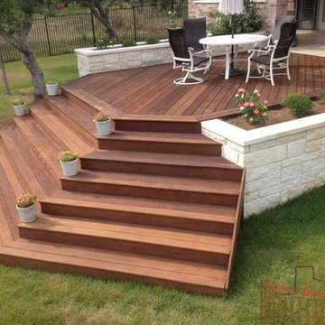 Ipe Hardwood Decking with Metal Framing, Limestone Flower Beds around Deck
