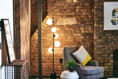Photo of a modern living room in London with medium hardwood floors.