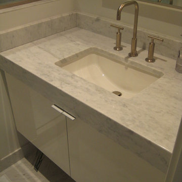 Vanity with Mitered Apron Front: Carrera marble