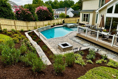 Example of a trendy concrete paver pool design in DC Metro