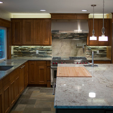 Inspiration for a large contemporary l-shaped slate floor eat-in kitchen remodel in Other with an undermount sink, flat-panel cabinets, medium tone wood cabinets, granite countertops, multicolored backsplash, stainless steel appliances and an island