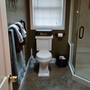 Transitional Corner shower bathroom remodel w/solid surface counter top