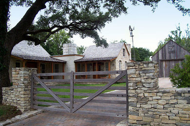 Rustic exterior home idea in Austin